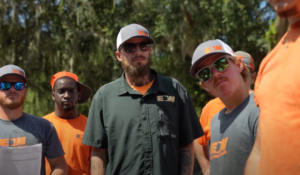 Electrical works employees having a team meeting